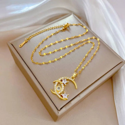 قلادة القمر والنجمة من الفولاذ التيتانيوم مع علبة #UNF430