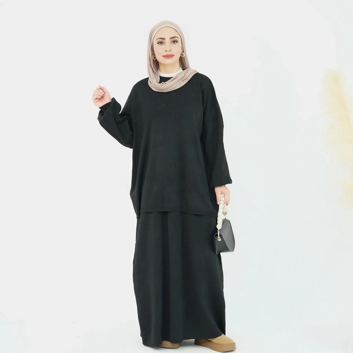 طقم ملابس محتشمة لفصل الشتاء والخريف مكون من قطعتين، يتكون من بلوزة محبوكة وتنورة